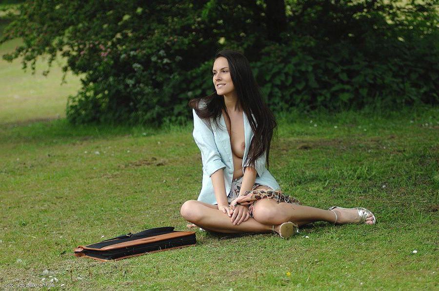 14P Pictures of a brunette hottie stripping outside