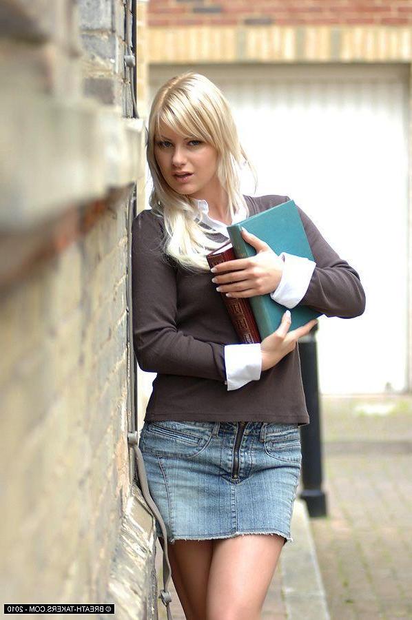 14P Pictures of a beautiful blonde girl showing her pussy
