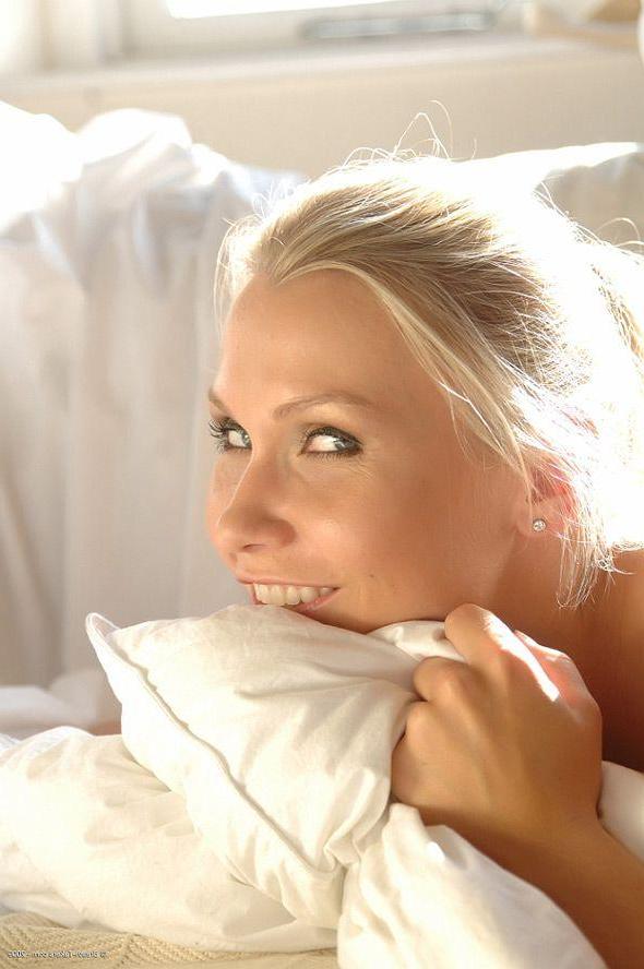 14P Pictures of a hot blonde girl stripping