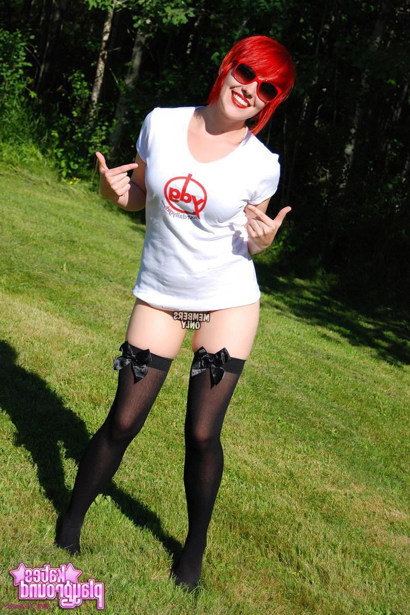 12P Redhead teen Sabrina teases as she dumps cold water all over her white shirt outdoors