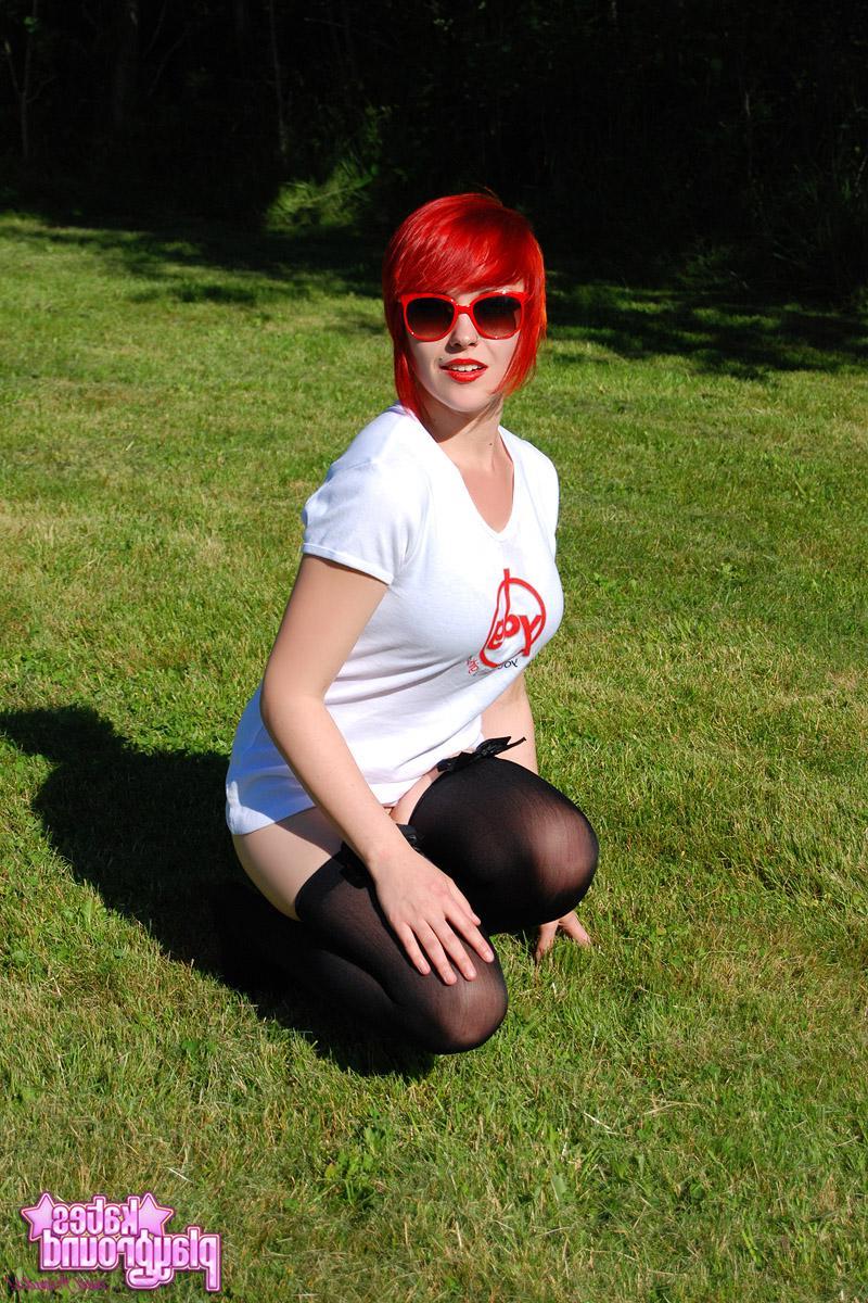 12P Redhead teen Sabrina teases as she dumps cold water all over her white shirt outdoors