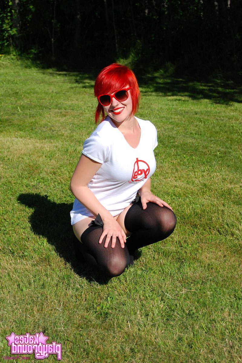 12P Redhead teen Sabrina teases as she dumps cold water all over her white shirt outdoors