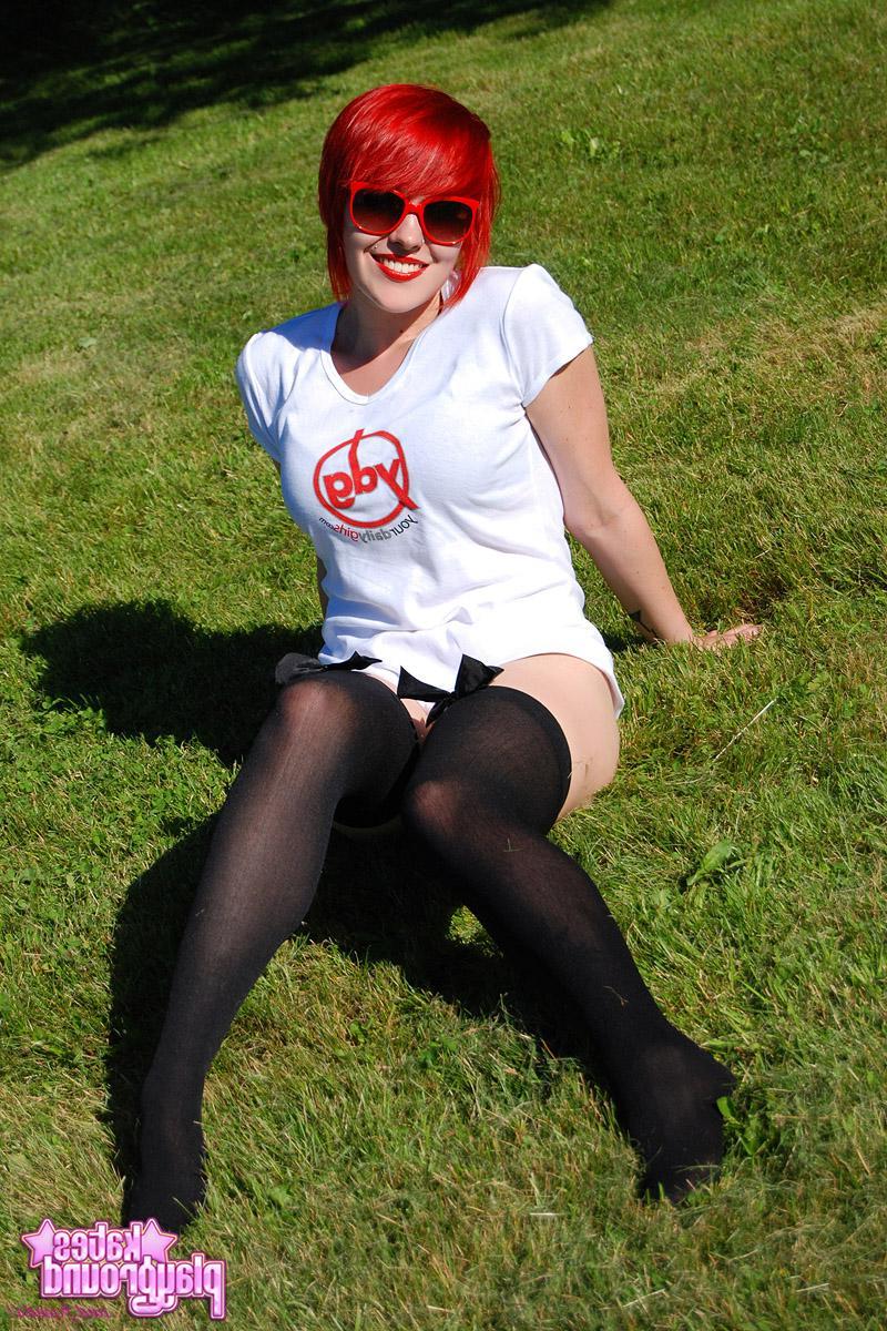 12P Redhead teen Sabrina teases as she dumps cold water all over her white shirt outdoors
