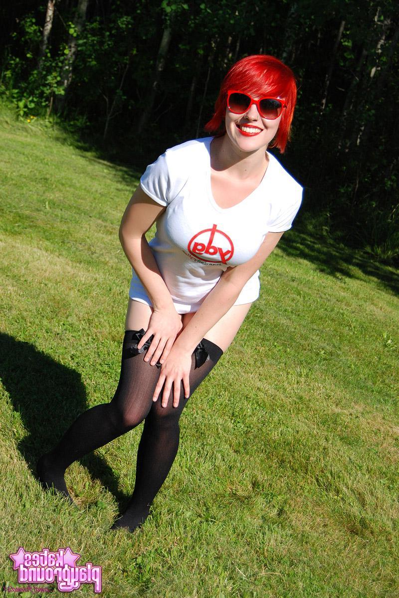 12P Redhead teen Sabrina teases as she dumps cold water all over her white shirt outdoors
