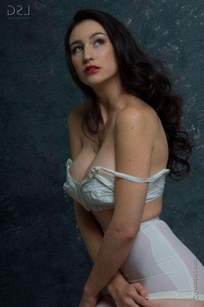 16P Pictures of a hot brunette teen fingering her wet pussy