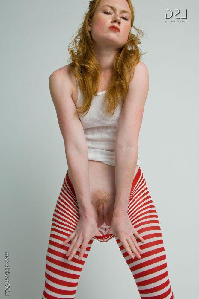 16P Pictures of a redhead hottie in red and white stripes
