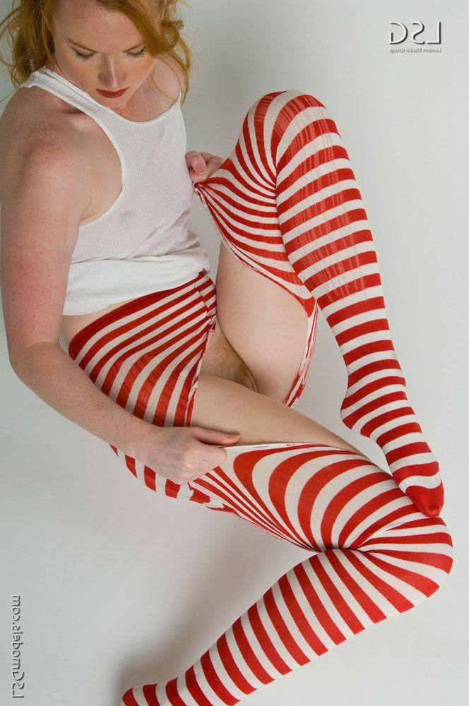 16P Pictures of a redhead hottie in red and white stripes