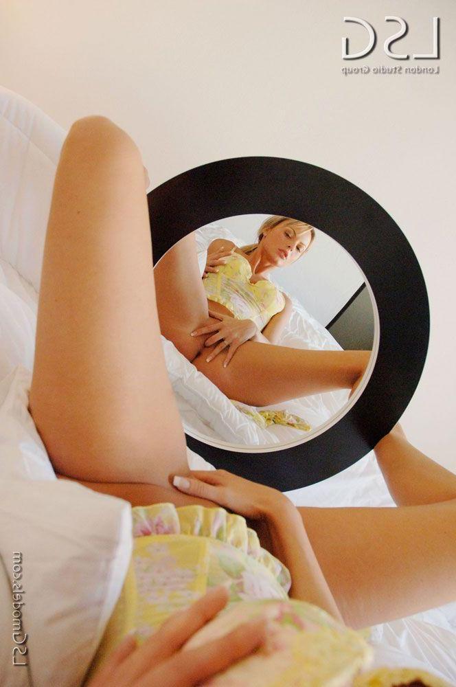 16P Pictures of a hot blond teen getting naughty with a mirror