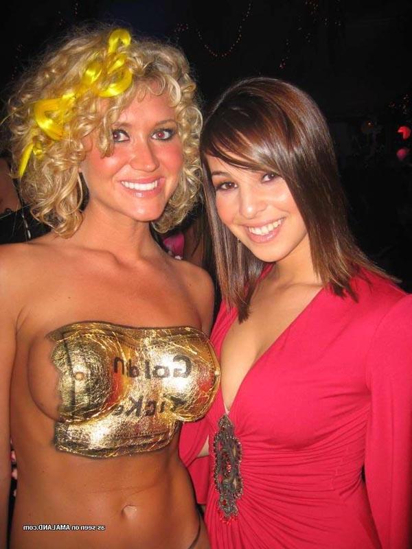 16P Hot brunette shows her cleavage in a sexy red dress