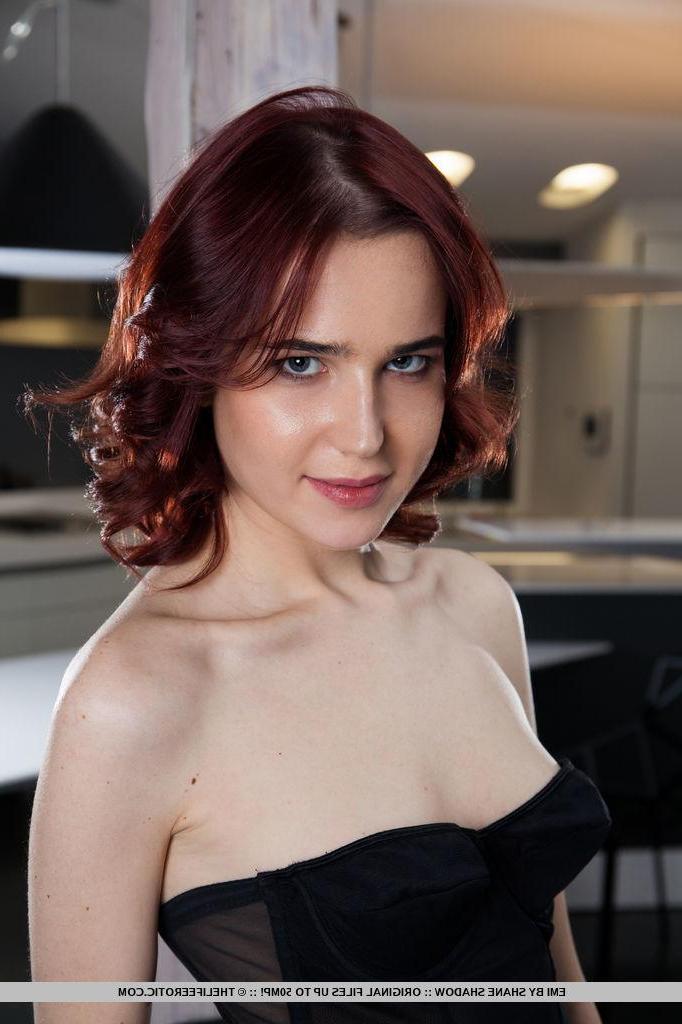 16P Redhead teen Emi masturbates in her black stockings in "Almost Real"