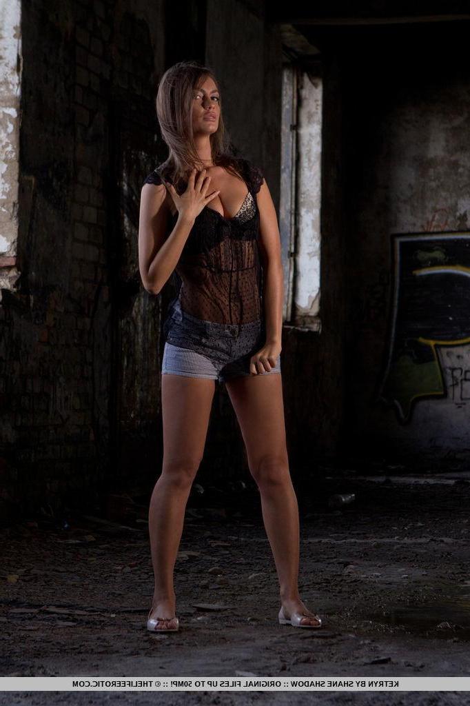 16P Brunette model Ketryn strips naked in a sexy gothic set