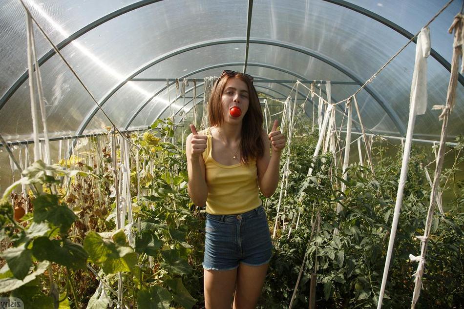 8P Pretty teen Katya Timakova does some gardening in her underwear