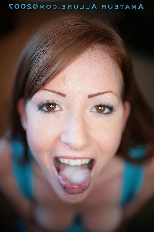 16P Pictures of sexy redhead teen going down on a hard cock