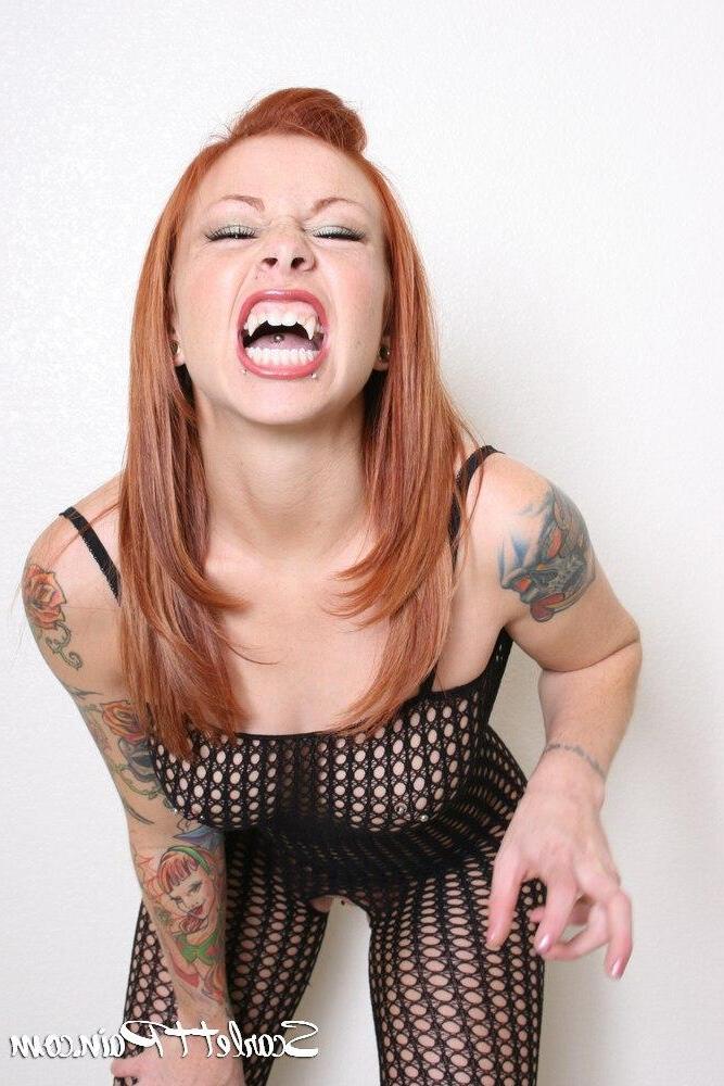 17P Pictures of teen Scarlett Pain showing off her fangs