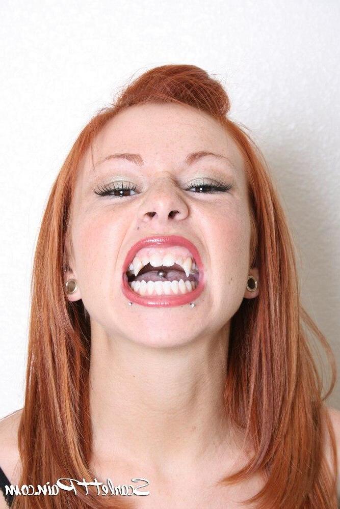 17P Pictures of teen Scarlett Pain showing off her fangs