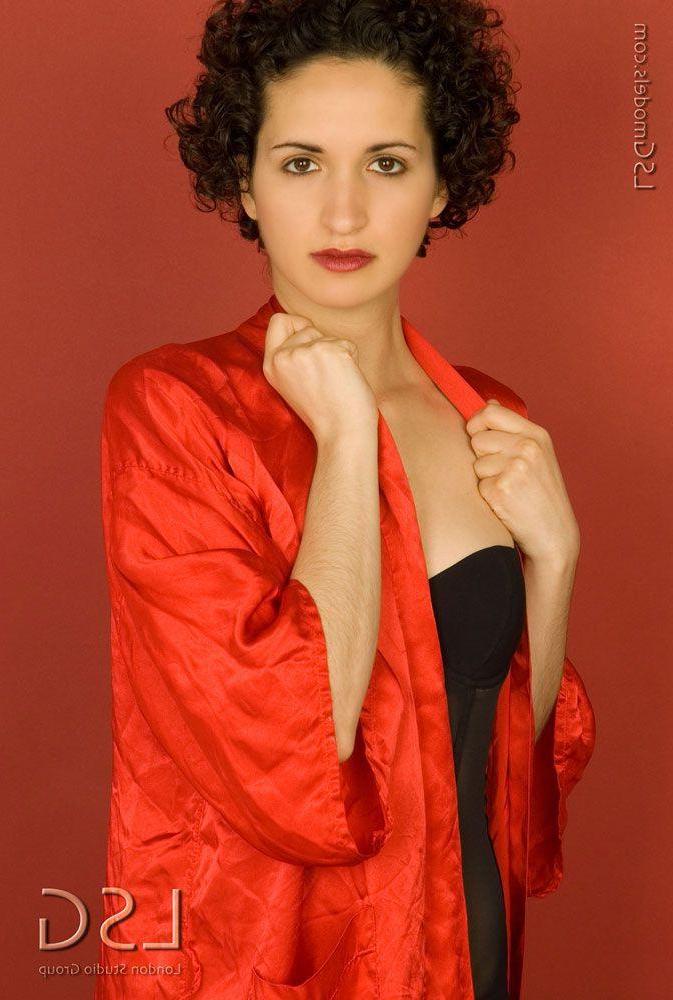 16P Pictures of a brunette teen showing off her tits