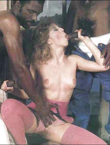 13P Brunette enjoying two big black cocks