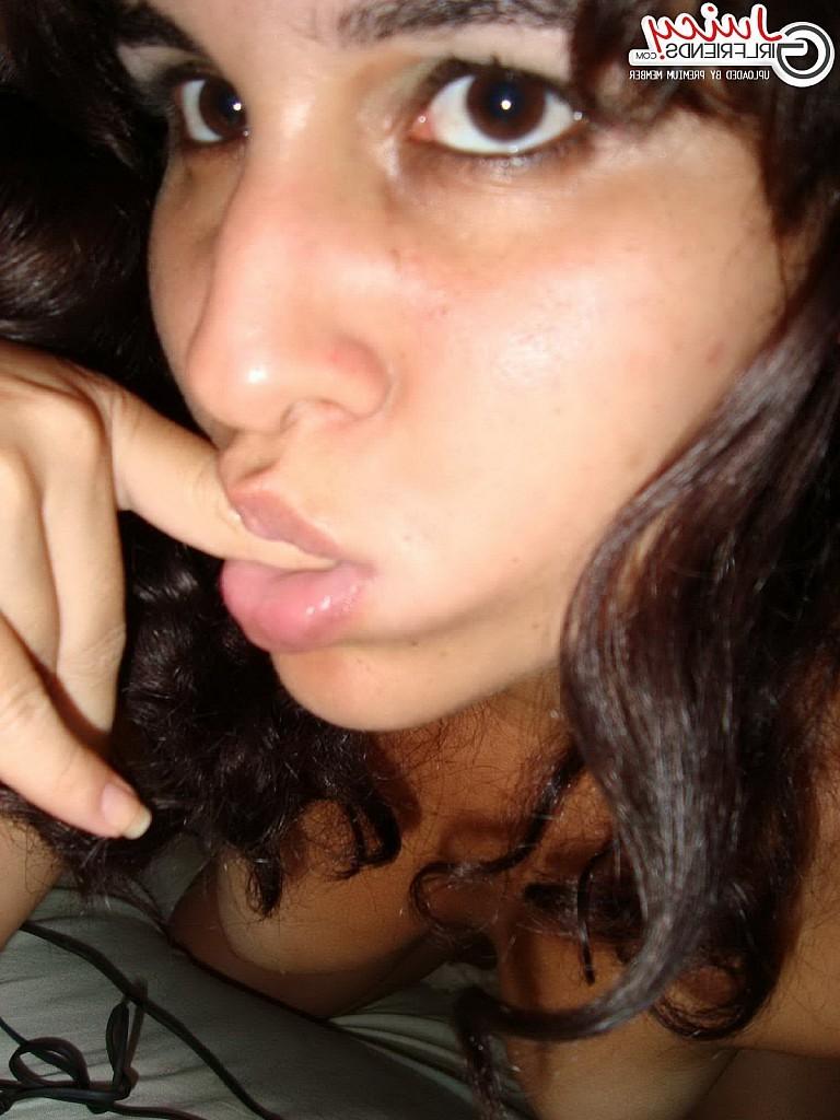 10P Amazing young brunette shows her pussy close up