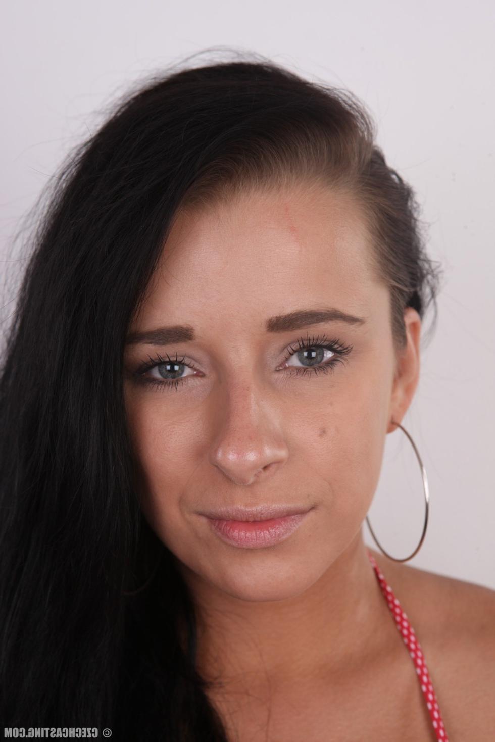 15P Tattooed brunette posing naked