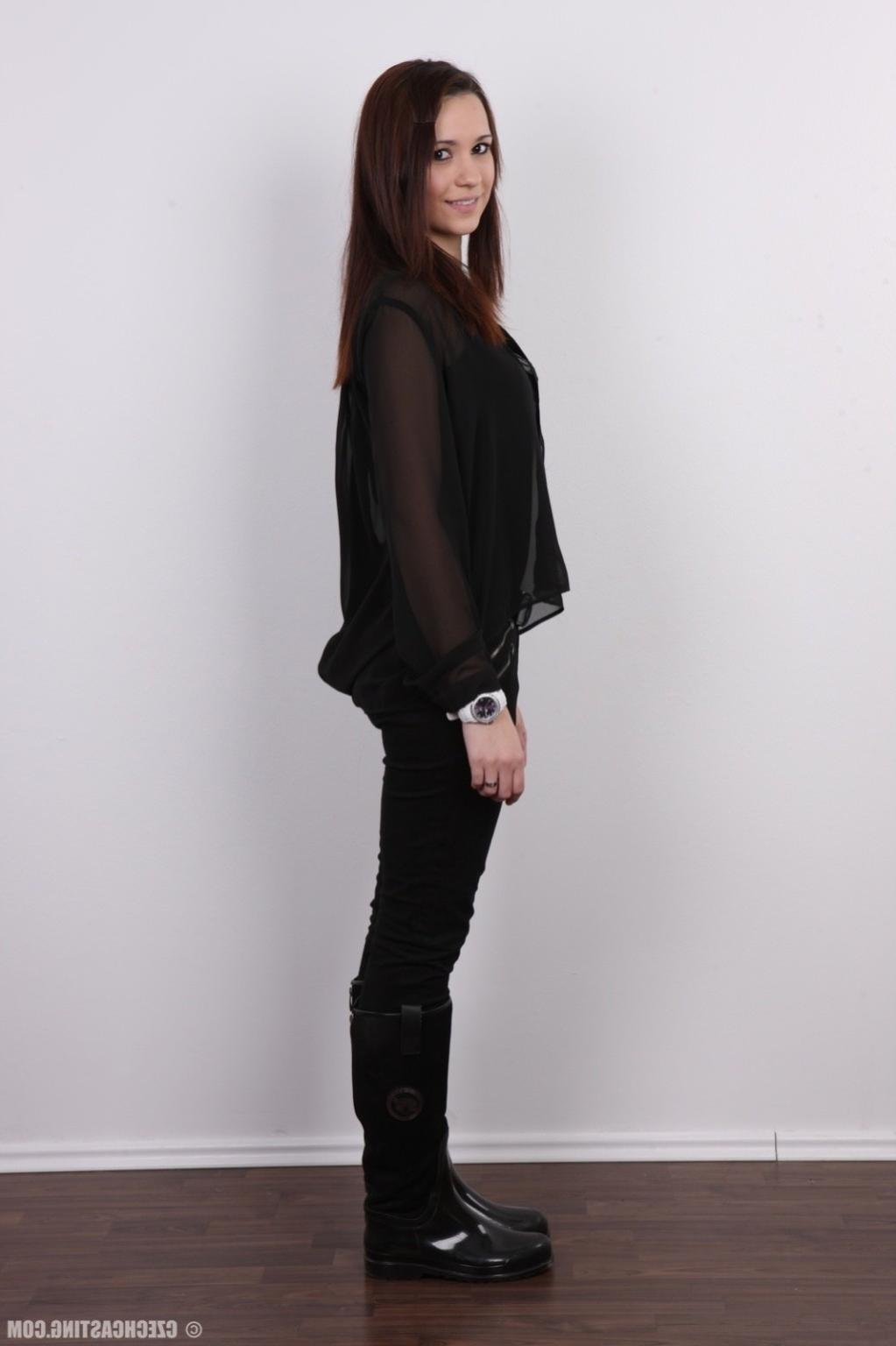 17P Young brunette poses for photo camera