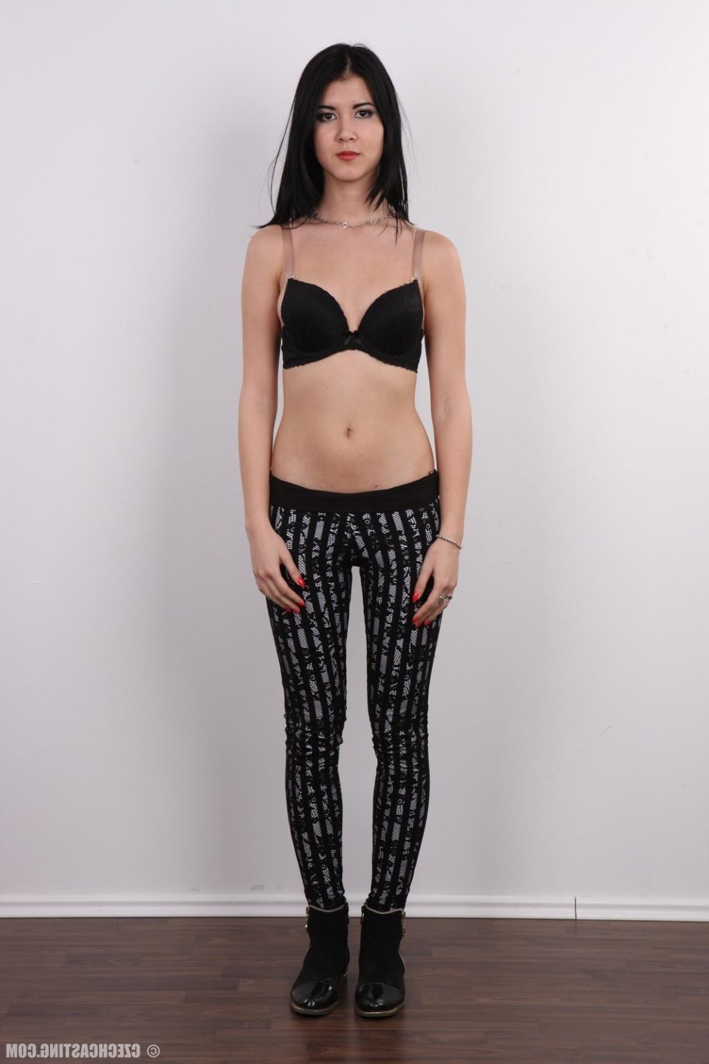 17P Petite brunette teen poses for photo camera