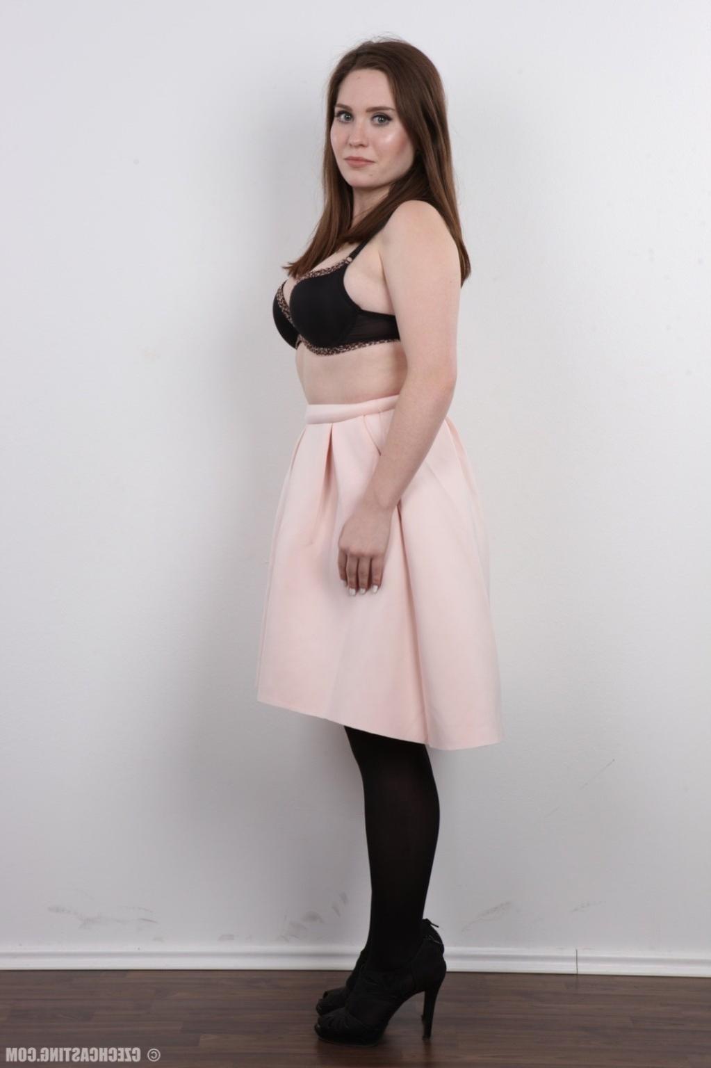 15P Mature brunette poses nude