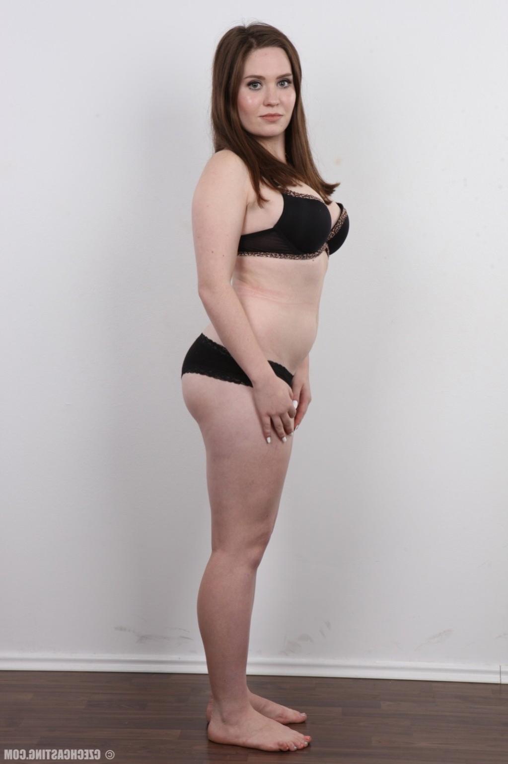 15P Mature brunette poses nude