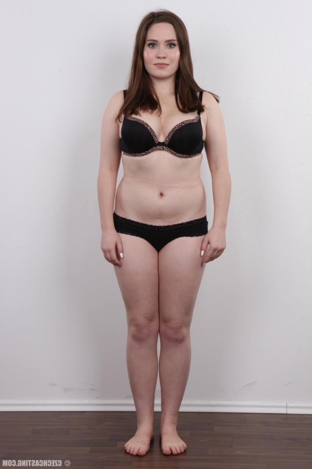15P Mature brunette poses nude