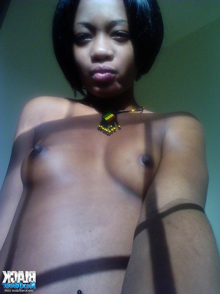 8P Black teen with small tits posing in the sun lights