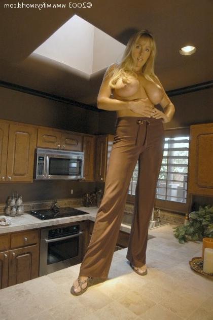 14P Pretty blonde topless in the kitchen
