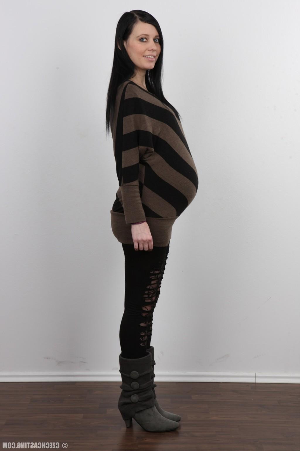 17P Pregnant brunette poses nude