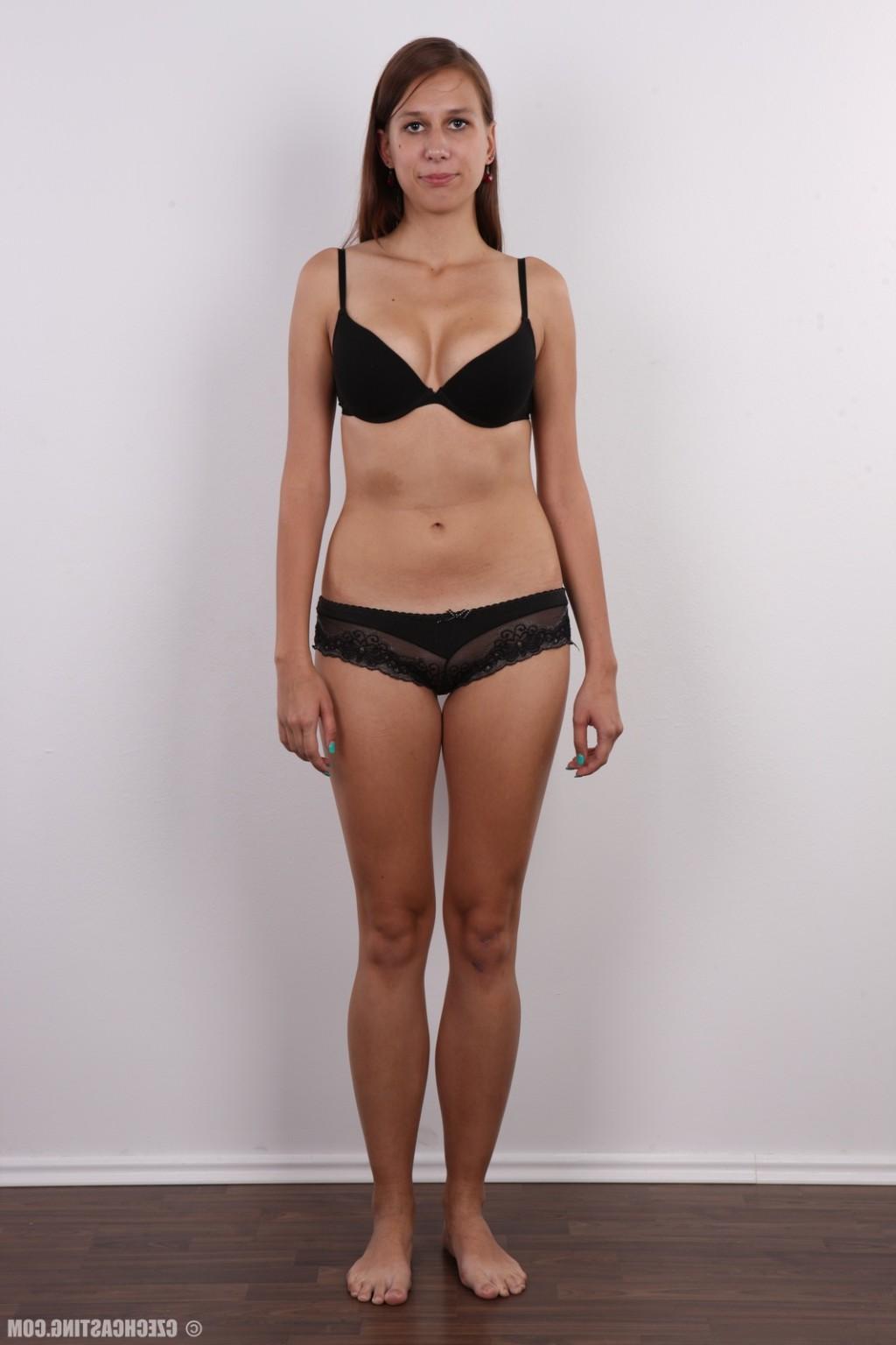 17P Tall brunette poses for photo camera