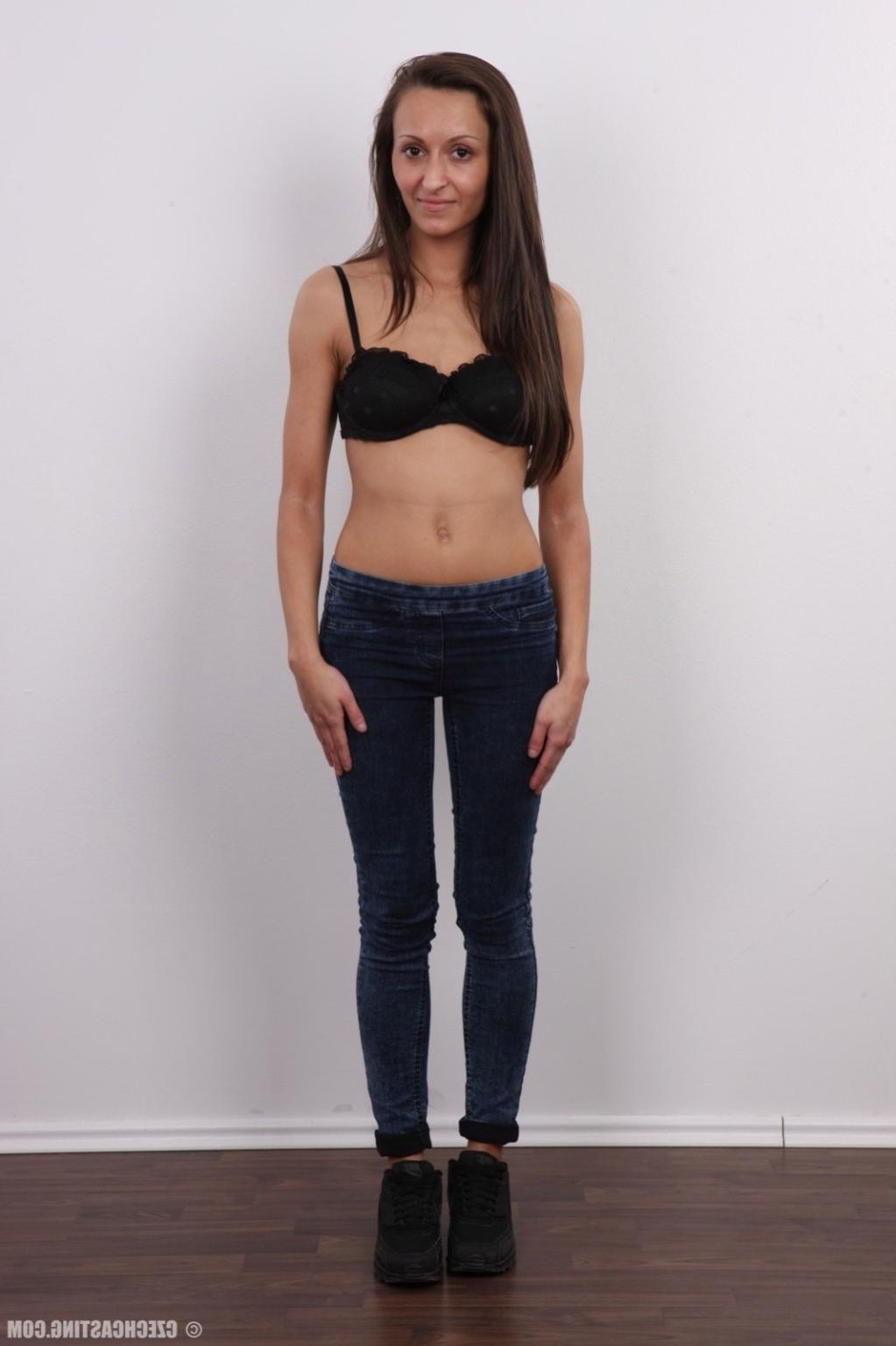 17P Slim brunette poses naked