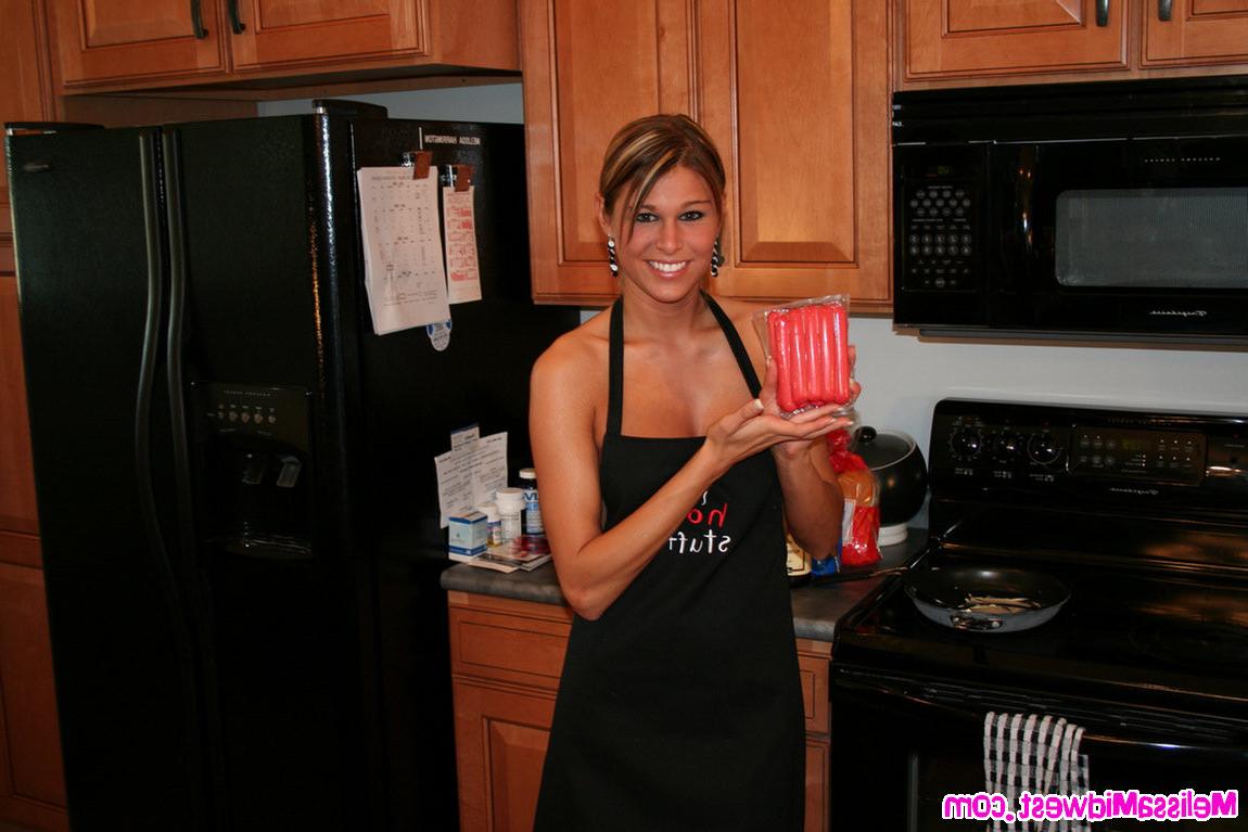 15P Melissa Midwest in the kitchen making hamburgers and hot dogs