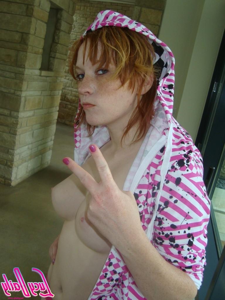 16P Big boob amateur redhead puts tits on window