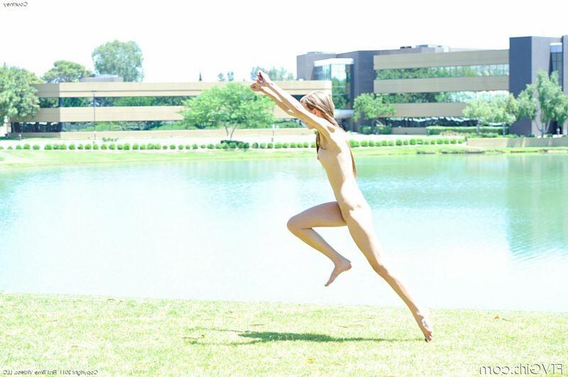 15P Flexible blonde does naked tricks in a public park