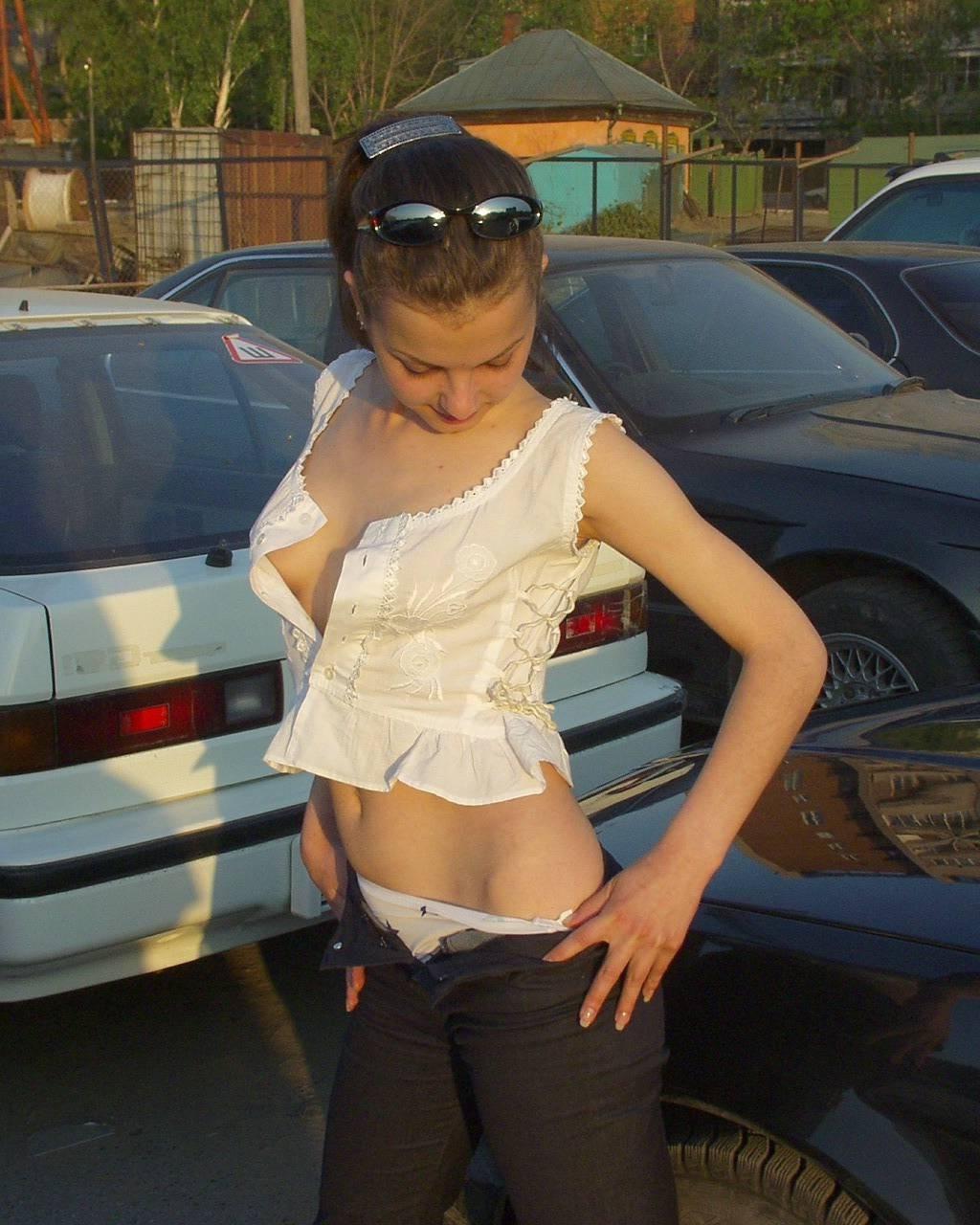 15P Cute amateur flasher Gila strips and exposes her firm tits