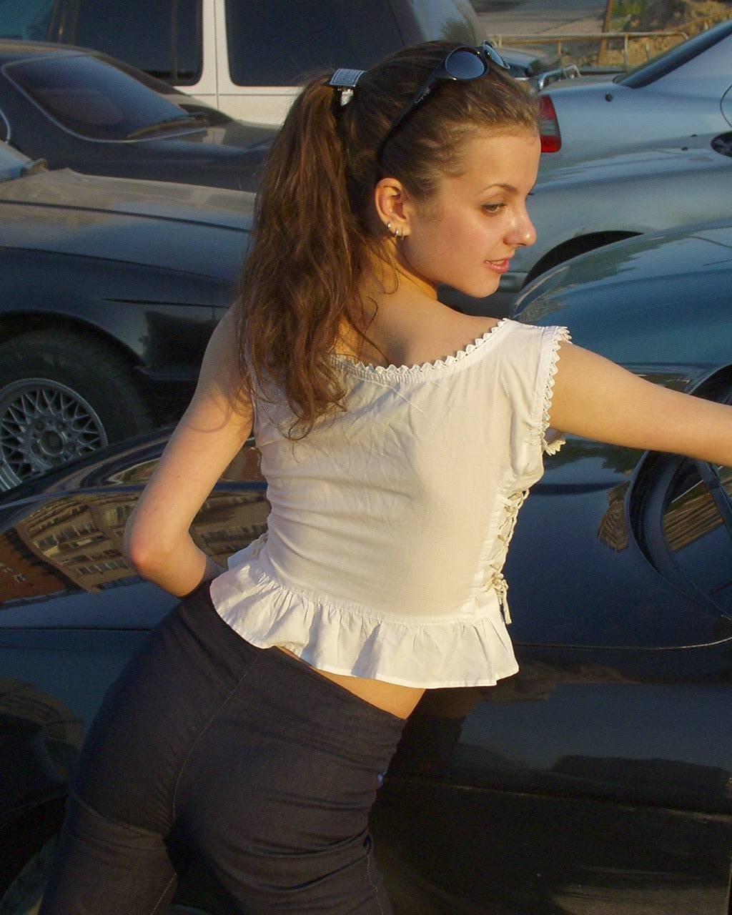 15P Cute amateur flasher Gila strips and exposes her firm tits