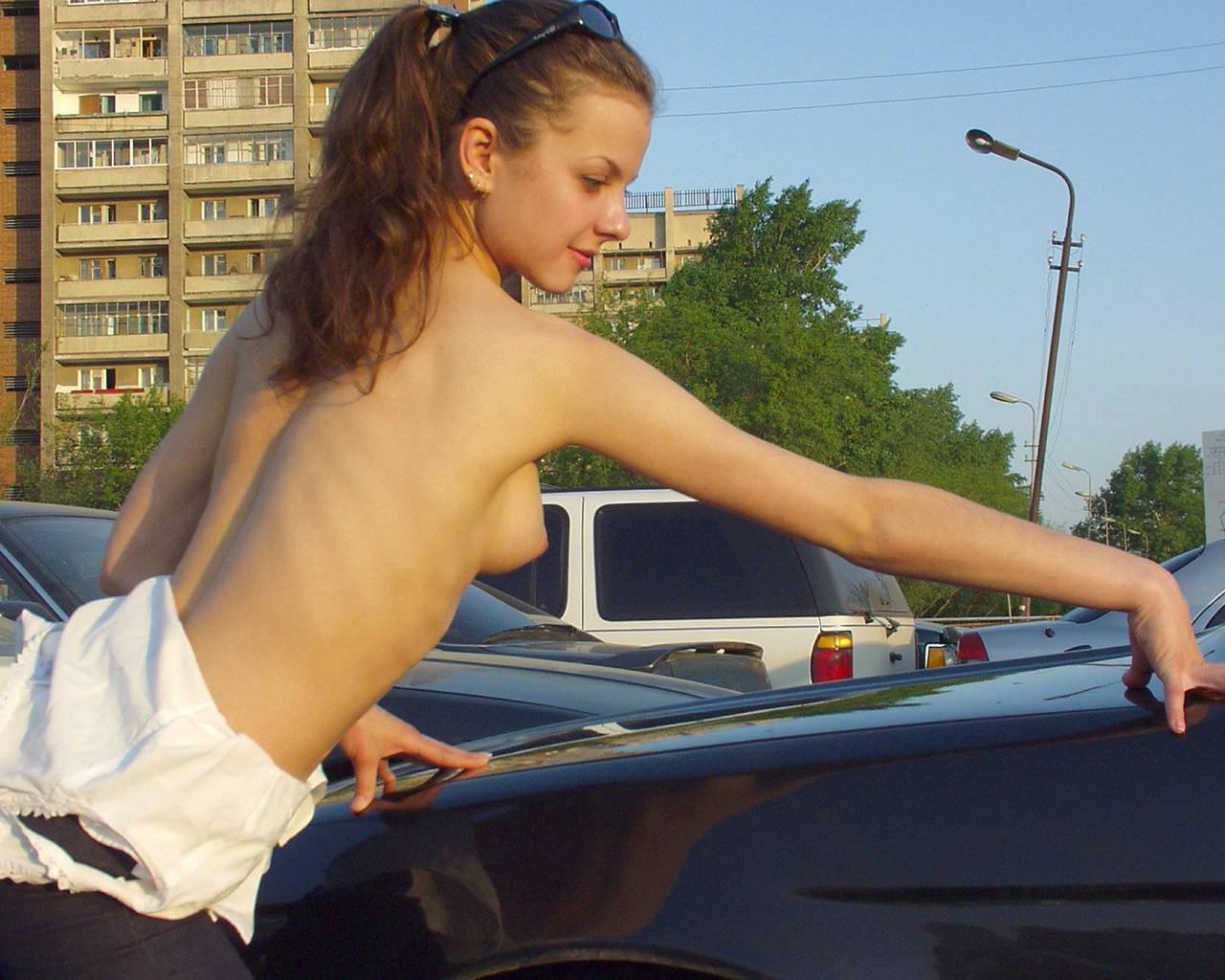 15P Cute amateur flasher Gila strips and exposes her firm tits