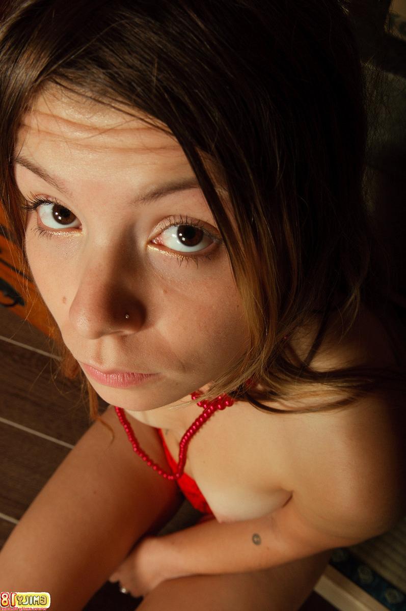 13P Emily 18 wears a red lace thong and spends much of the gallery with her tight yo