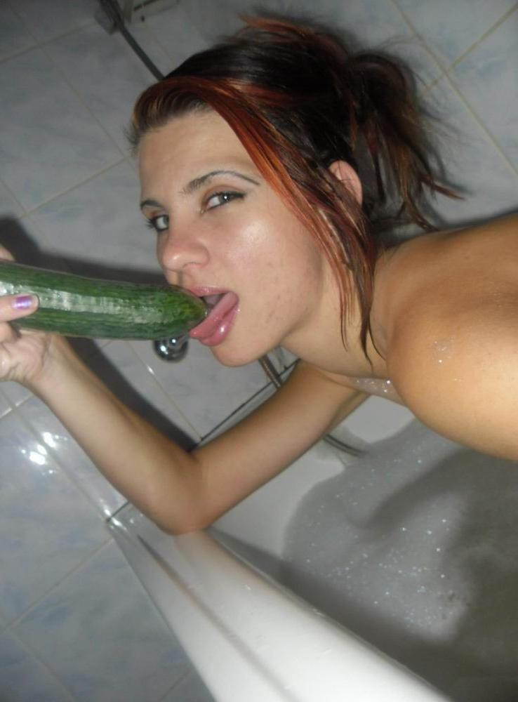 19P long legged brunette toying cucumber up her pussy