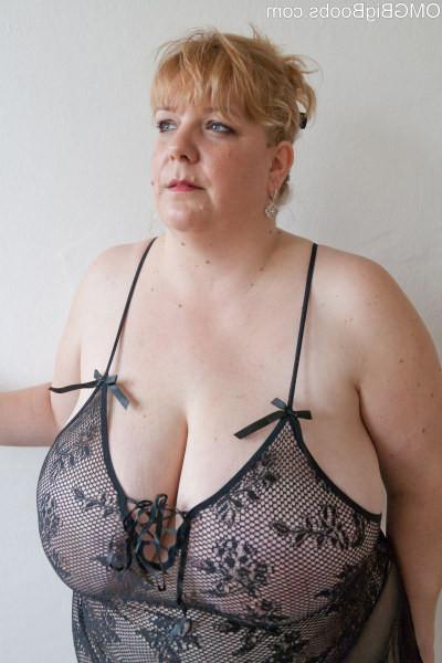 15P Mature BBW amateur lets huge tits pop out of lingerie
