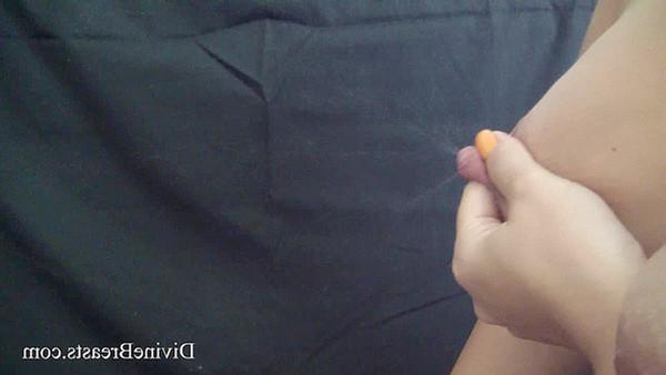 15P Closeups of a lactating babe squirting milk from tits