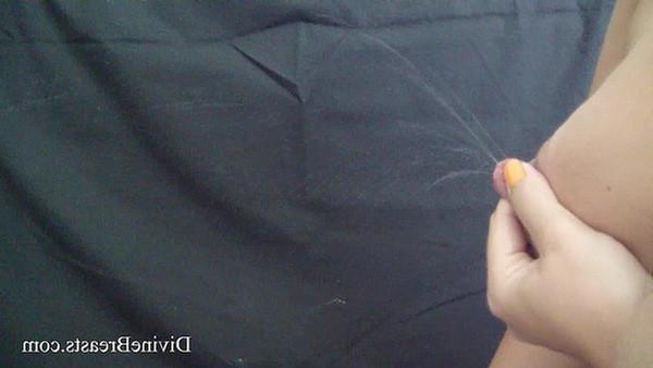 15P Closeups of a lactating babe squirting milk from tits