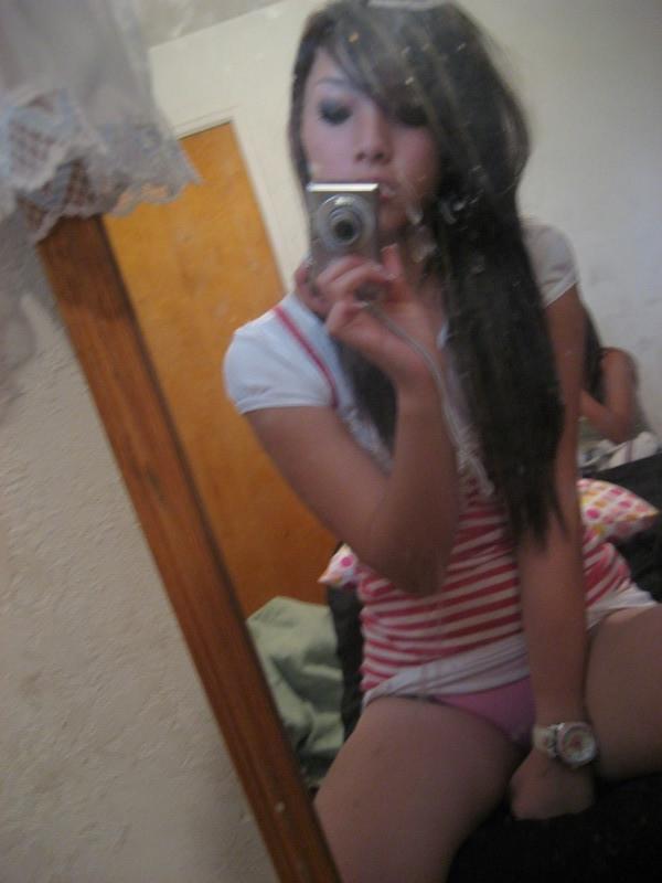15P Asian teen girlfriends posing for the camera