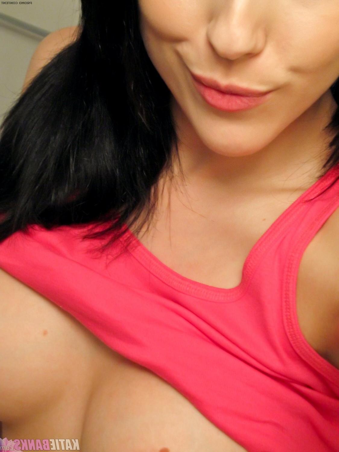 15P Big tit babe strips nude