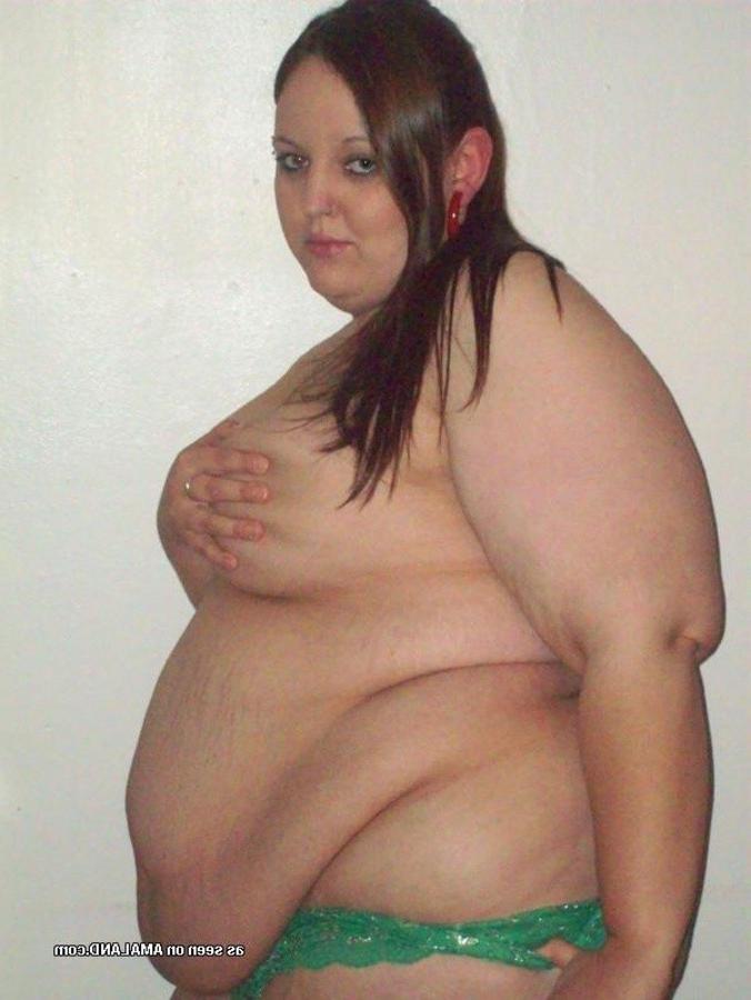 10P Gallery of a BBW with a big belly posing for the camera