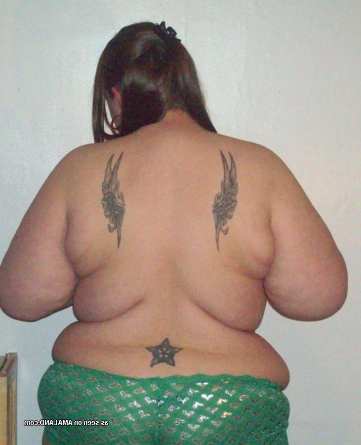10P Gallery of a BBW with a big belly posing for the camera