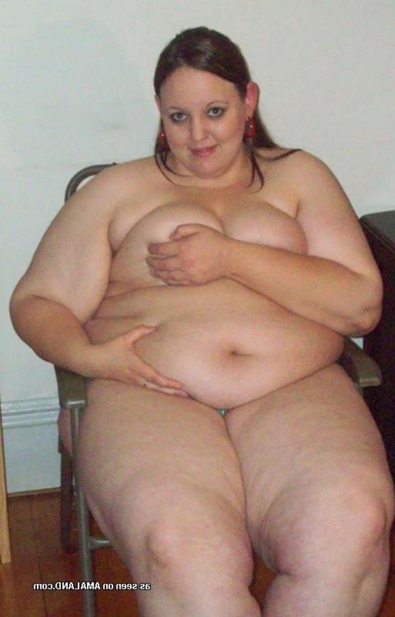10P Gallery of a BBW with a big belly posing for the camera