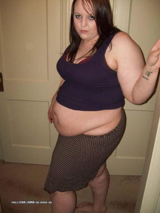 10P Gallery of a BBW with a big belly posing for the camera